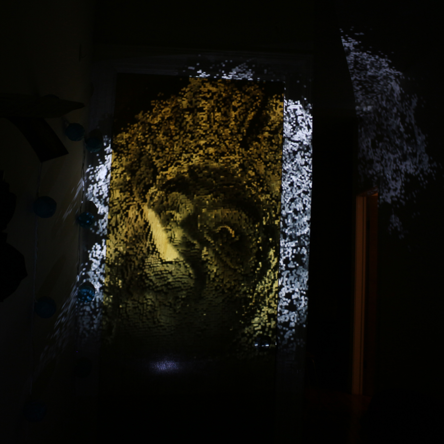 Image of a projection of the deity on a sculpture